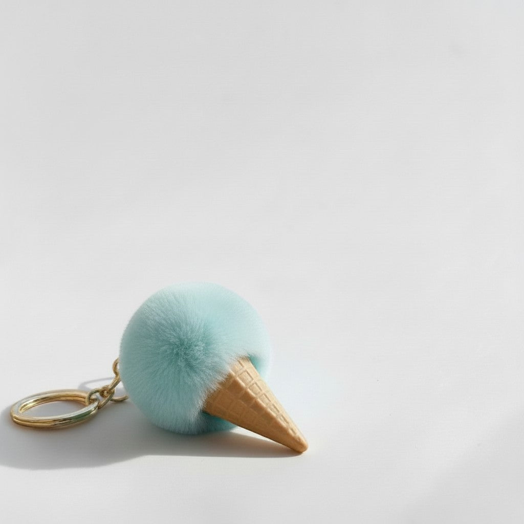 Il mio negozio aqua faux fur gelato cone keychain with gold tone clasp.