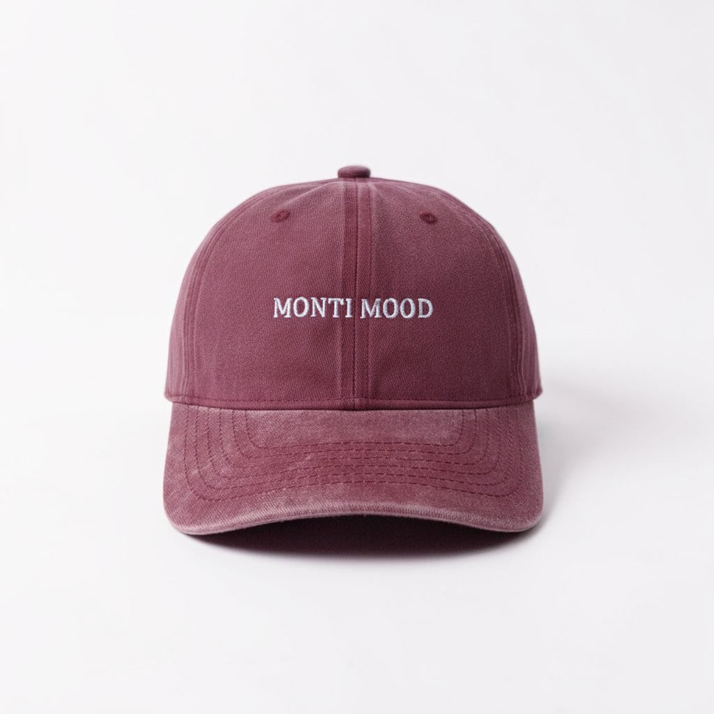 Il mio negozio burgundy washed cotton baseball cap with "MONTI MOOD" embroidered in white.