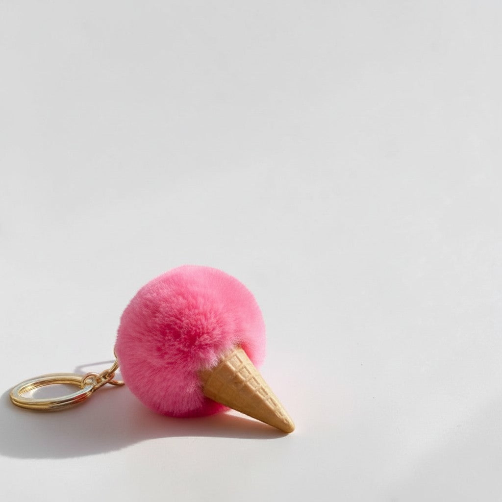Il mio negozio pink fluffy gelato cone keychain with gold clasp. Faux fur pom-pom scoop.